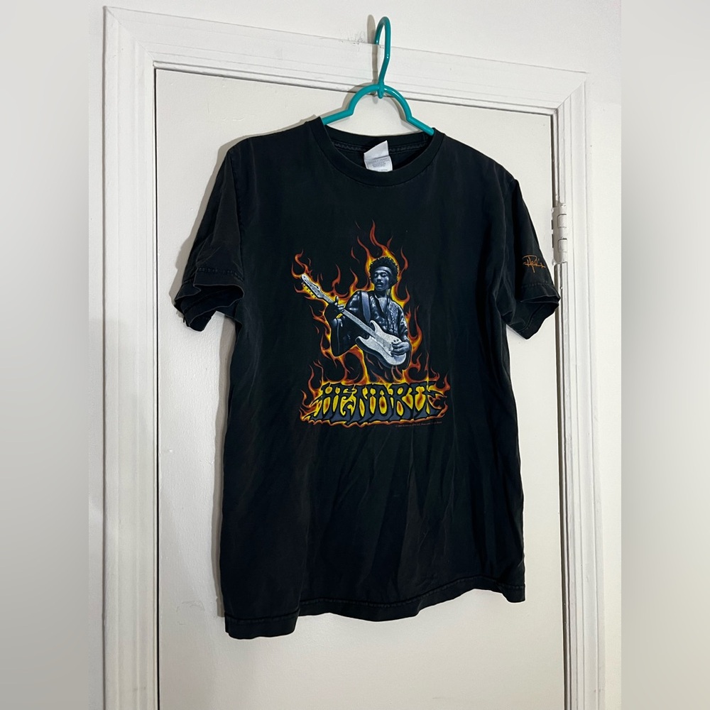 Jimi Hendrix Black Short Sleeve Shirt
Size Medium
Small hole near armpit